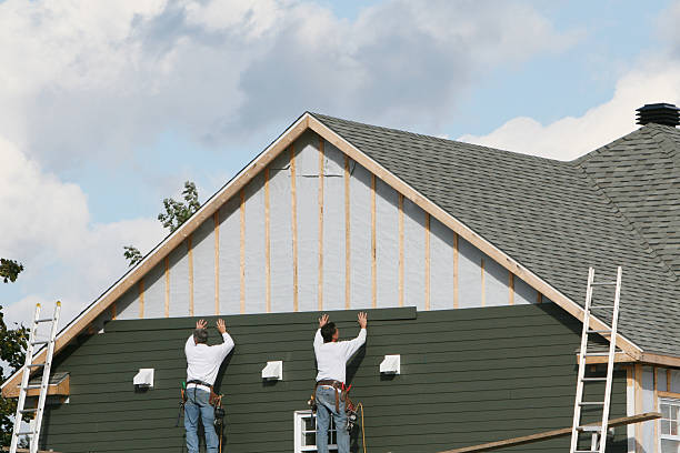 Professional Siding Installation technician working in Orange, VA
